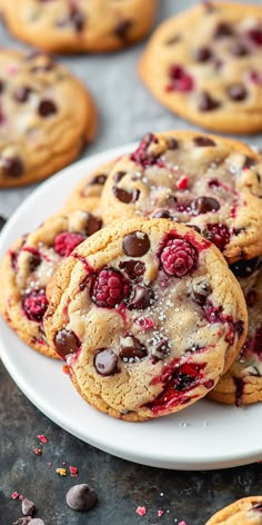 chocolate chip raspberry cookies on a white plate