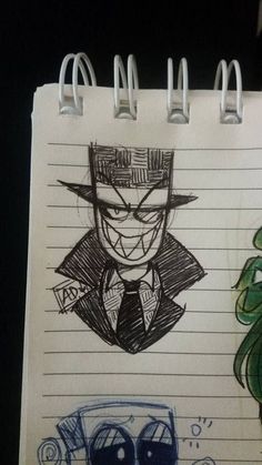 a notebook with some drawings on it and a drawing of a man in a top hat