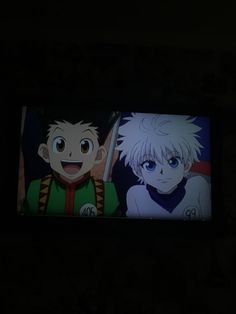 two anime characters in the dark with one staring at the camera and the other smiling