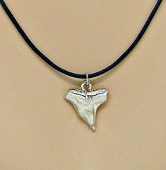 Silver Shark Tooth Necklace Adjustable Sized for Youth to Adults Surfer SUP 6ADJN #beach #SharkNecklace #sup #surfer #BoysNecklace #SharkWeek #MensNecklace #BeachJewelry #NecklacePendant #adjustable Shark Tooth Necklace Mens, Necklace Styles, Shark Tooth Pendant, Silver Shark, Small Shark, Boys Necklace, Tooth Pendant, Shark Necklace, Shark Tooth Necklace