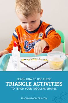 a young boy is sitting at a table and playing with his triangle activity book, learn how to use these triangle activities to teach toddlers shapes