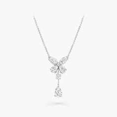 A scintillating symbol of good fortune, we recreate the enduringly feminine form of a butterfly in pear shape and marquise diamonds in our Classic Butterfly Diamond Drop pendant. Deftly suspended from a delicate white gold chain, the butterfly's beguiling brilliance is enhanced by an elegant pear shape diamond drop suspended beneath. A signature motif for the House, throughout history the butterfly has been celebrated for its ephemeral beauty, inspiring an entire universe of jewels at Graff. An Luxury Butterfly-shaped Engagement Jewelry, Elegant Luxury Petal-shaped Jewelry, Luxury Pear-shaped Elegant Drop Necklace, Luxury Classic Pear-shaped Diamond Necklace, Luxury Drop Shaped Jewelry For Engagement, Luxury Drop-shaped Jewelry For Engagement, Luxury Unique Drop-shaped Jewelry, Graff Jewelry, Diamond Drop Pendant