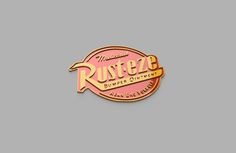 the logo for rustezza is shown in pink and gold on a gray background