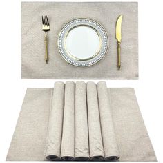 a place setting with napkins, silverware and gold - plated utensils