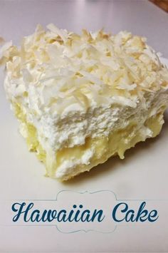 a close up of a piece of cake on a plate with the words hawaiian cake