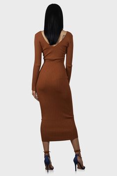 This midi sweater dress is anything but basic! Features a v-neck and ribbed knit with plenty of stretch. Complete the look with your favorite leather jacket. Color: Rust Model wearing size Small Size S measures 53" from center back to hem Runs true to size Fabric has stretch 70% Rayon /30% Nylon Hand wash cold Ribbed V-neck Sweater Dress For Date Night, Brown Ribbed V-neck Dress, Brown Ribbed Stretch Midi Dress, Brown Stretch Ribbed Midi Dress, Brown Ribbed Midi Sweater Dress, Brown Ribbed Knee-length Midi Dress, Brown Ribbed Stretch Sweater Dress, Brown Stretch Ribbed Sweater Dress, Fall Bodycon Midi Dress With V-neck