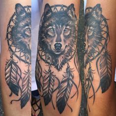 two black and white tattoos on the legs of someone's leg, one with a wolf