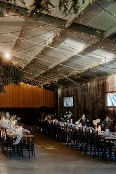 a large room with tables and chairs set up for a wedding reception at the venue