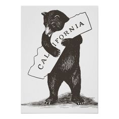 a bear holding a sign that says california