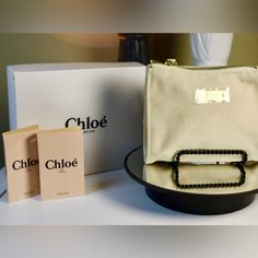 This Lovely Chlo Gift Set Includes A Chic Beige Canvas Pouch With A Gold-Tone Chlo Logo Plaque, Perfect For Carrying Your Beauty Essentials Or Using As A Small Clutch. The Set Also Features Two Miniature Chlo Eau De Parfum Samples, Offering A Delicate And Timeless Floral Scent With Notes Of Peony, Lychee, And Rose. The Set Comes In The Original Chlo-Branded Box, Making It Ideal For Gifting Or Personal Use. Great For Christmas Please Ask Questions Below Chloe Pouch, Chloe Logo, Chloe Bags, Small Clutch, Box Making, Chloe Bag, Makeup Pouch, Floral Scent, Canvas Pouch