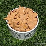 a bowl full of love bark is on the grass, and it says love bark