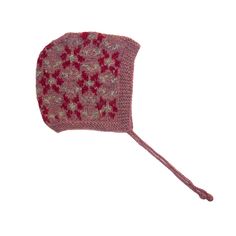 a red and white knitted hat on a string