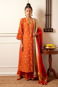 Shop for Loka by Veerali Raveshia Orange Chanderi Silk Kurta Sharara Set for Women Online at Aza Fashions V Neck Kurta, Simple Kurtis, Silk Overlay, Sharara Pants, Kurta Sharara Set, Kurta Sharara, Orange Jacket, Fashion Vocabulary, Silk Kurta