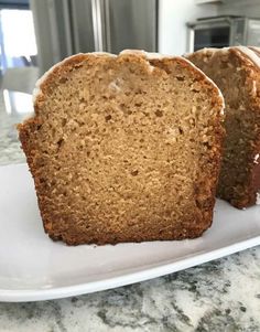 two slices of banana bread on a white plate