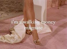 a woman's legs in gold shoes with the words i'm a walking money magmate