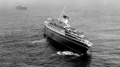 an old black and white photo of a boat in the water