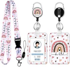 two lanyards with id holders on them, one has a rainbow and the other has hearts