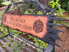 a wooden sign that says not the dice you've been in your favors on a park bench