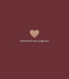 a heart with the words understand more, judge less in white on a red background