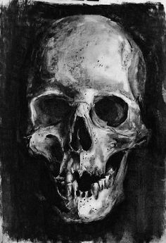 a black and white drawing of a skull