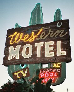 a neon sign for the western motel in las vegas