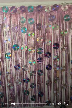 the curtain is decorated with sequins and beads