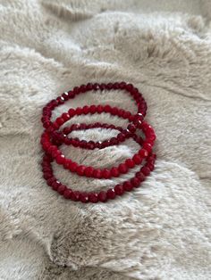 Set of 3 stacking sparkle bracelets in the color scheme shown in the pictures. Made with Stretchy string. Sparkle Bracelet, Stacking Bracelets, Hollywood Fl, Red And Purple, Red Bracelets, Stretchy Bracelets, Bracelet Stack, Ruby Red, Bracelet Set