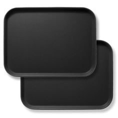 two black square trays sitting on top of each other