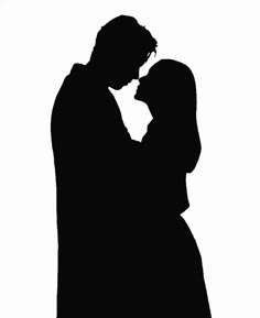 the silhouette of a man and woman kissing each other