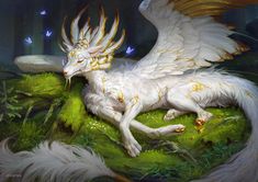 a white dragon laying on top of a lush green field