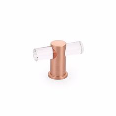 an image of a copper and clear glass bottle stopper on white background with clipping