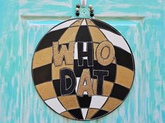 a door with a sign that says who dat on it