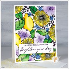 a card with lemons and flowers on it