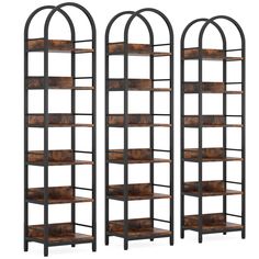 two metal and wood bookcases with arched shelves