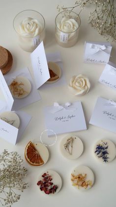 several different types of buttons and cards on a table