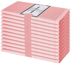 a stack of pink napkins on top of each other with a label that reads,