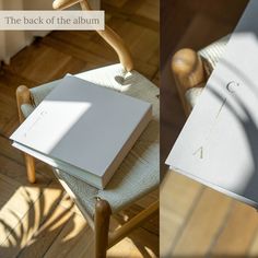 the back of an album sitting on top of a wooden chair next to a book