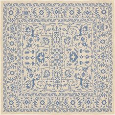 a blue and white rug with an intricate design