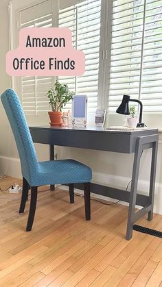 a blue chair sitting in front of a desk with an amazon office finds sign on it