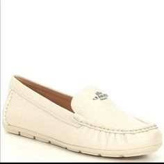 Brand New White Calf Leather Loafers For Spring, Elegant White Loafers With Leather Footbed, Elegant White Loafers, Coach Leather Loafers With Round Toe, Classic Coach Leather Loafers, Chic White Loafers With Leather Footbed, Cream Leather Flats For Office, Coach Flat Leather Loafers, Coach Leather Loafers For Spring