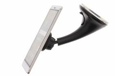 a cell phone is held up to the side of a car windshield mirror with a clip on it