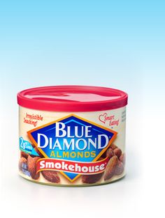 a can of blue diamond almonds sitting on a white surface with an orange lid