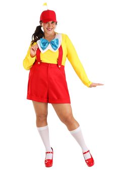 a woman dressed in a clown costume posing for the camera with her arms out and legs crossed