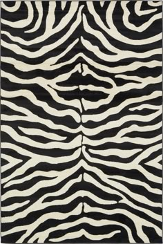 a black and white rug with zebra stripes