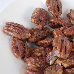 nuts are on a white plate and ready to be eaten