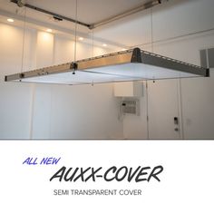 an image of a suspended light fixture in a room with the words, all new auxcover semi transparent cover