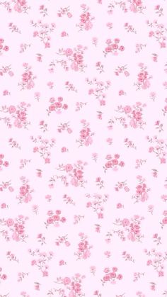 a pink flowered background with small white flowers on the bottom and light pink petals on the top