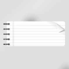 an empty notepad with some black pins sticking out of the top and one white piece of paper attached to it