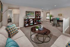 the living room is clean and ready for guests to use it as a home office