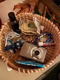 a wicker basket filled with items on top of a table